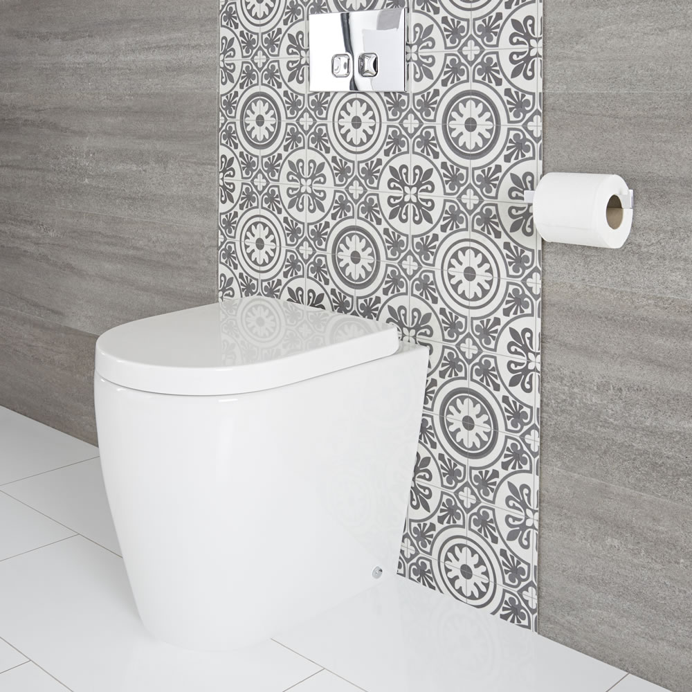 Inodoro Oval Adosado a Pared con Tapa con Cierre Amortiguado - Otterton