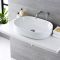 Lavabo Sobre Encimera Oval de Cerámica de 590x425mm con Mezclador de Lavabo Mural - Otterton